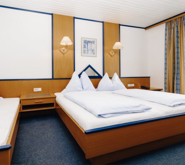 Gemütliche Betten zum Träumen im Hotel Garni Tannenhof in Salzburg